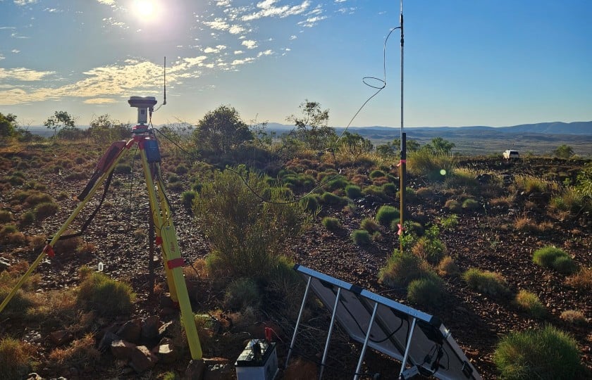 total station and solar panels in use on BHP Western Ridge Crusher project